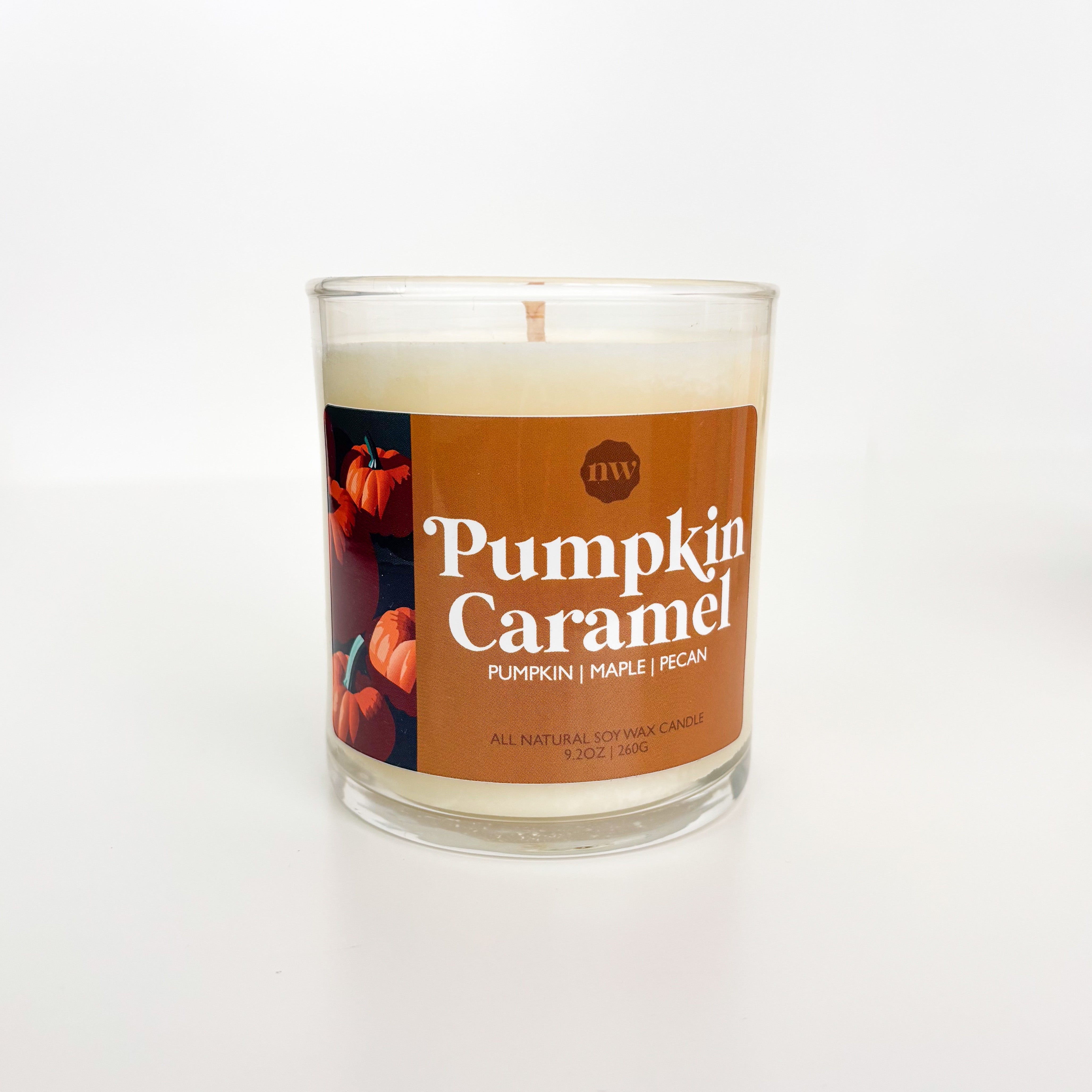 Pumpkin Caramel candle with a label on a white background